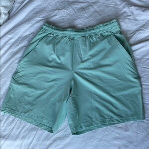 Men’s teal pace breaker lululemon shorts